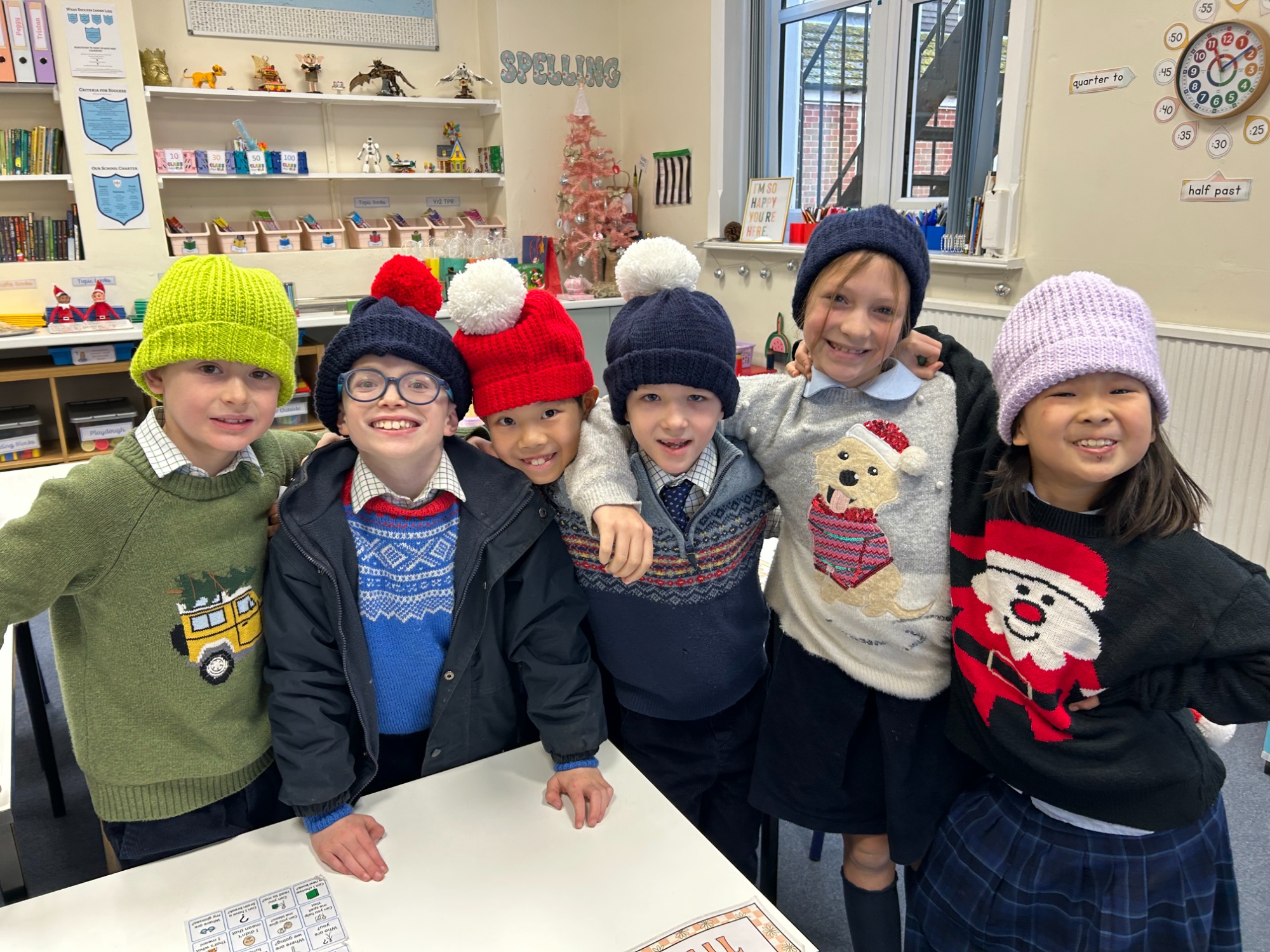 Horris Hill School pupils during a Saturday enrichment lesson, all wearing knitted hats