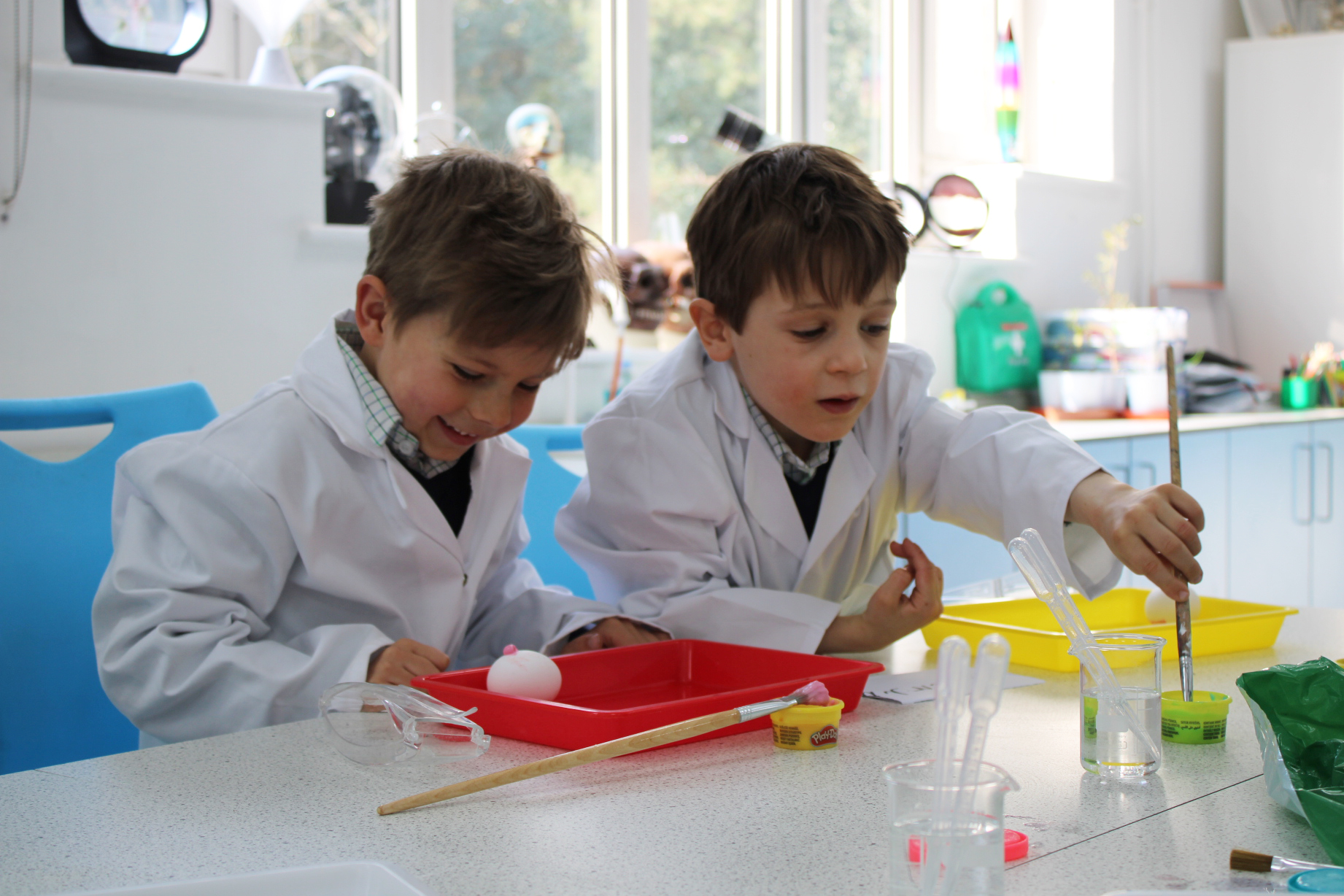 Two Reception pupils at Horris Hill learning in the Science Lab