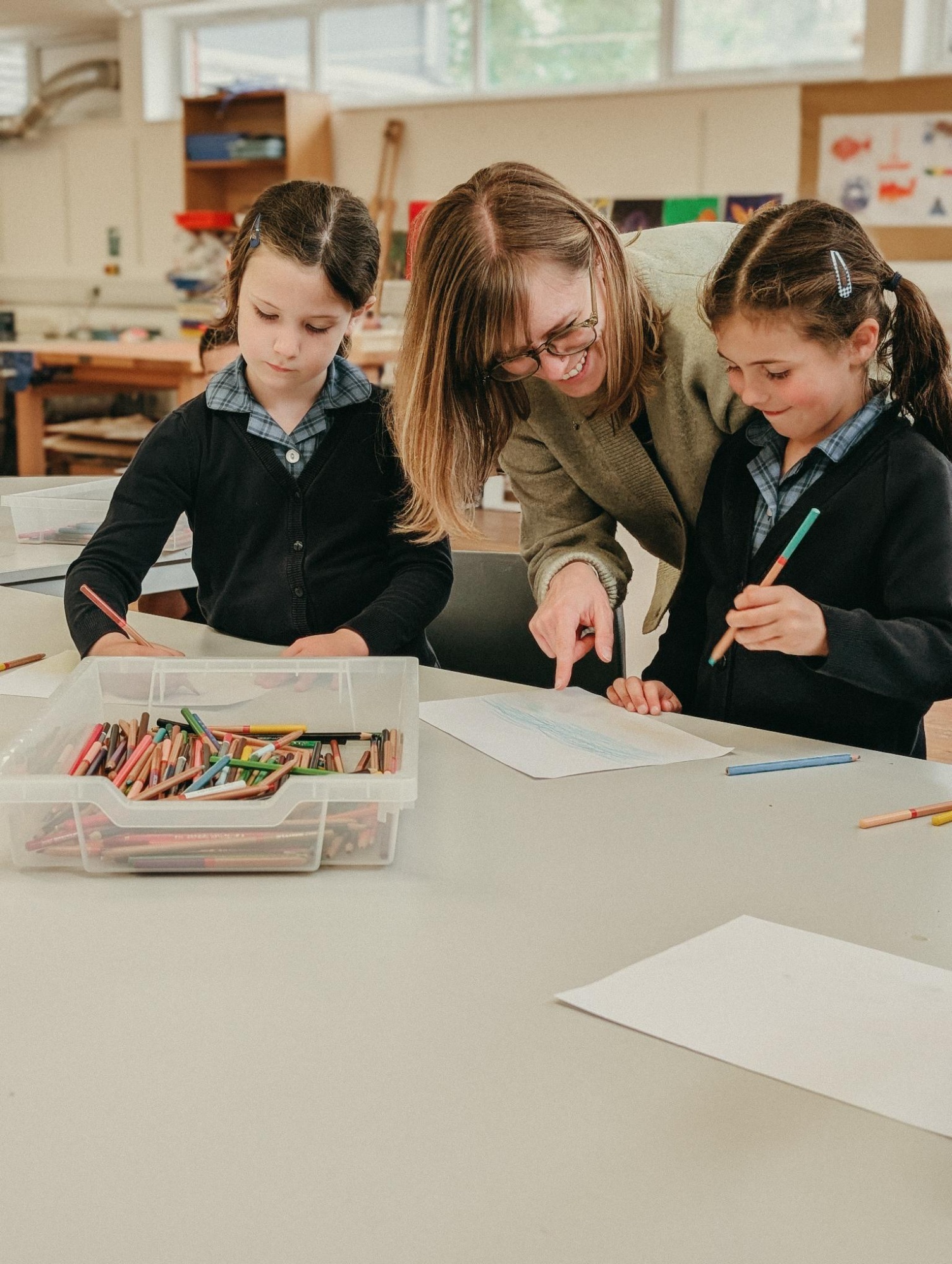Horris Hill pupils painting pictures in the school art room